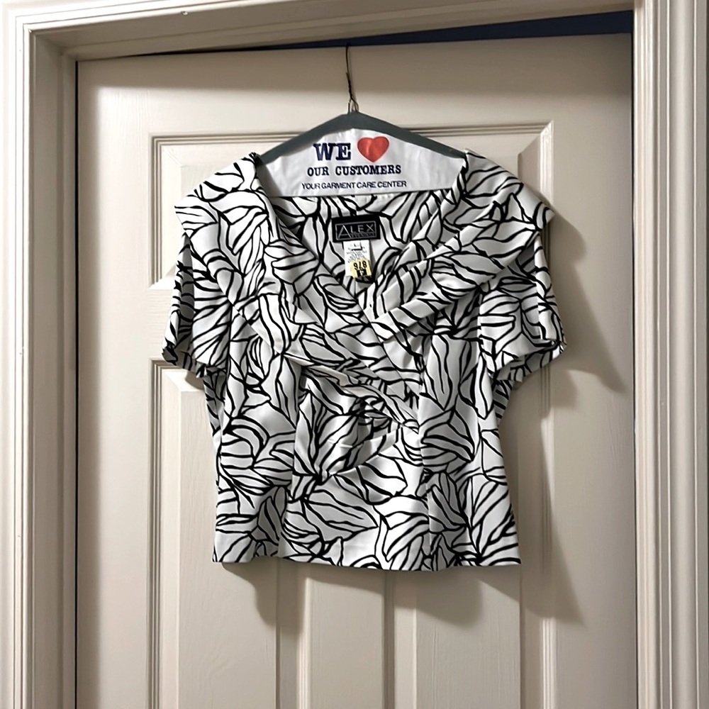 Dressy, Alex evenings, crisscross, black and white top in size large.